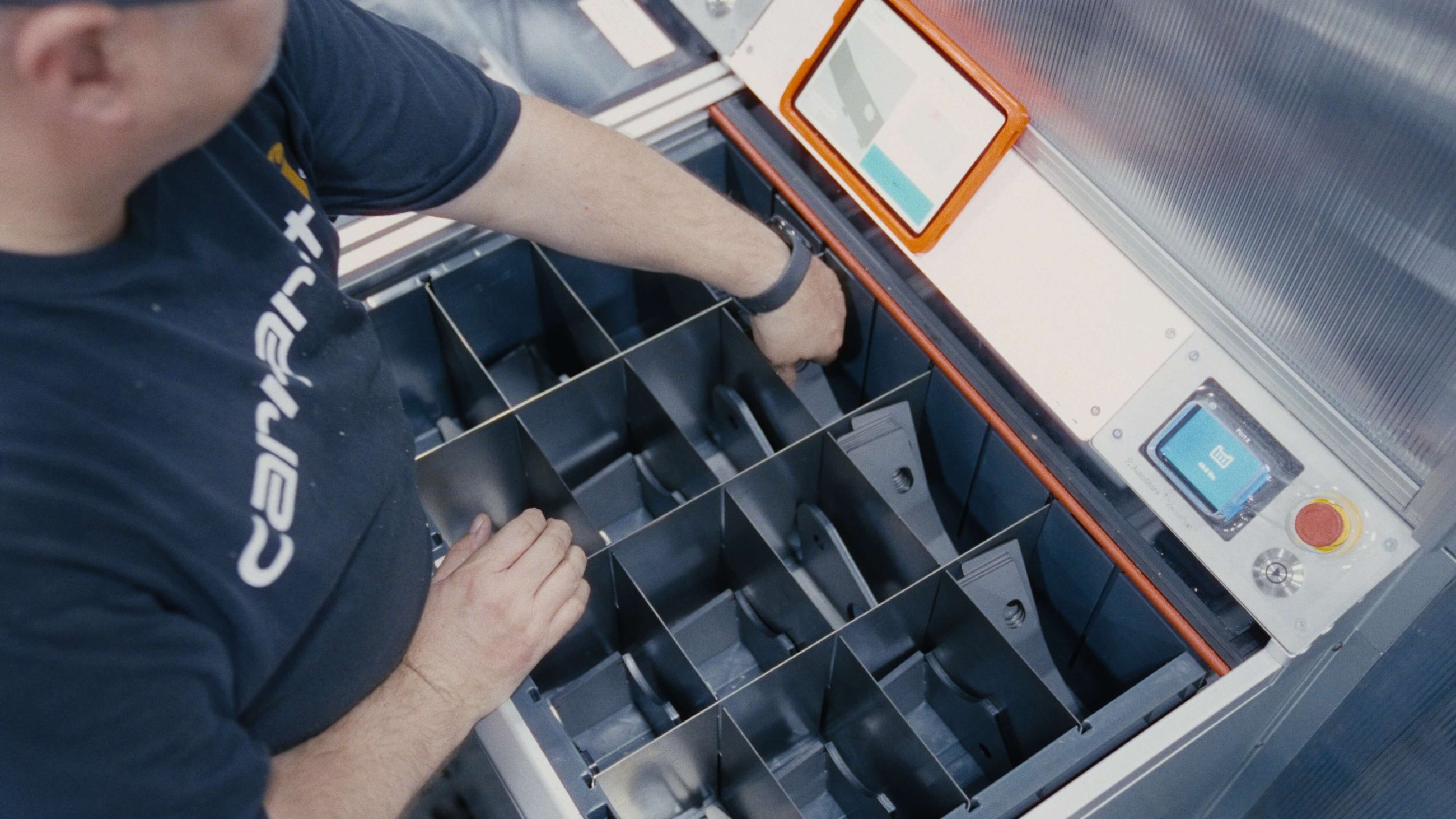 Pio cube storage system in a U.S. car parts manufacturer's warehouse, storing small parts vertically to fit more inventory in the same space