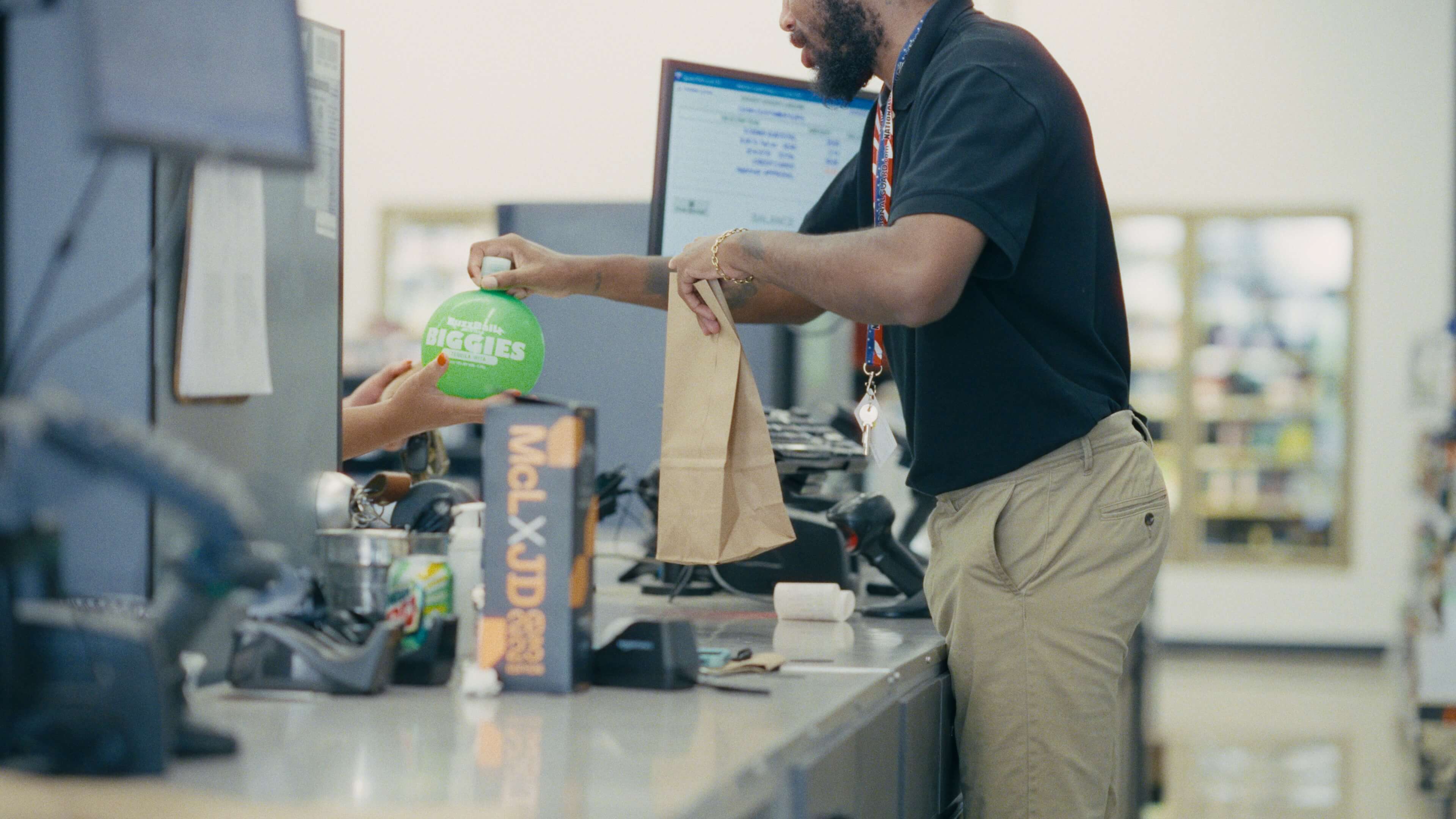 Goody Goody staff retrieving stock from Pio in a Dallas liquor store backroom