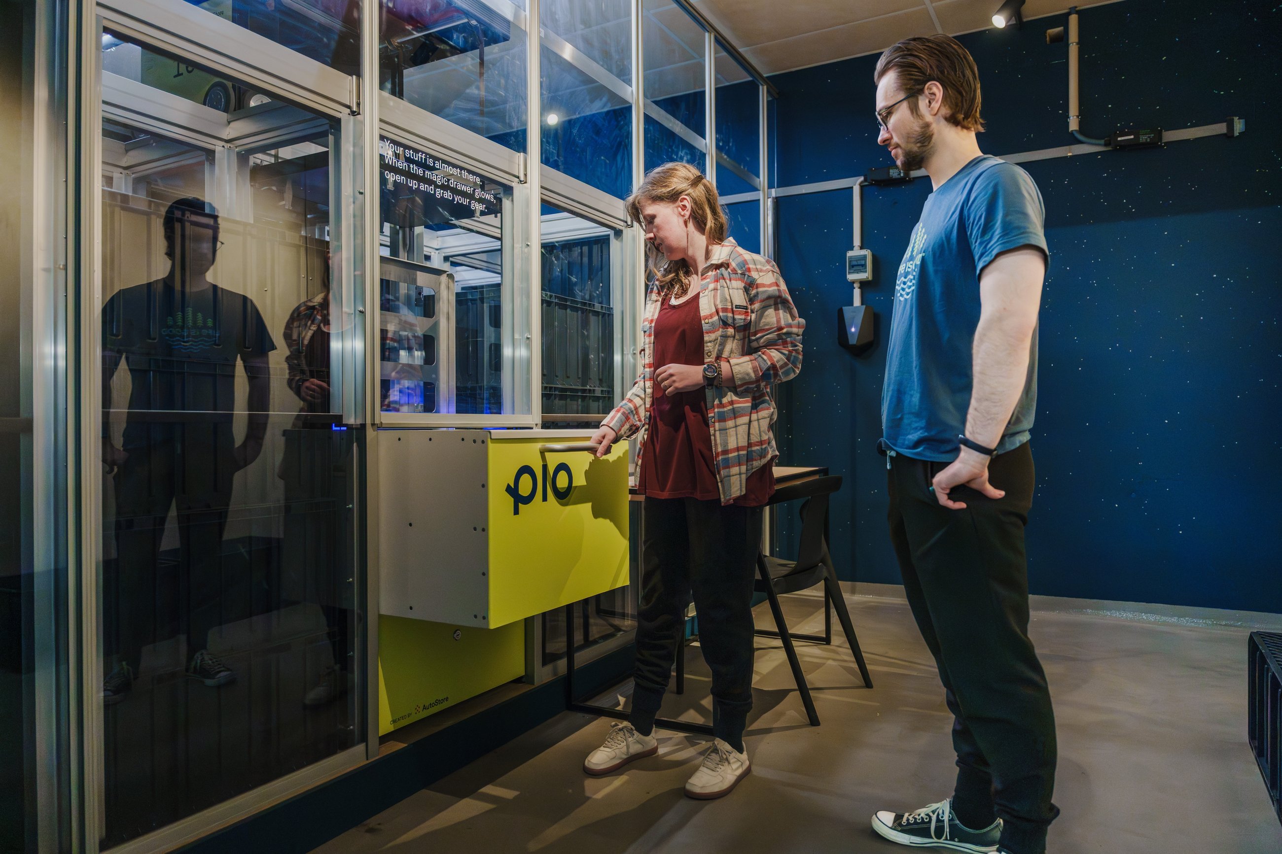 Robotic cube storage system in a residential building basement, designed to save space and simplify everyday storage